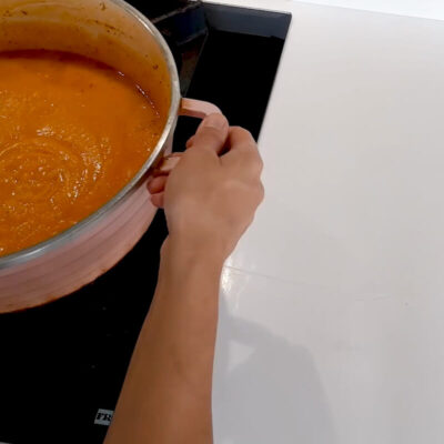 Cozy up with a bowl of vegan pumpkin soup - easy, healthy, and flavorful!