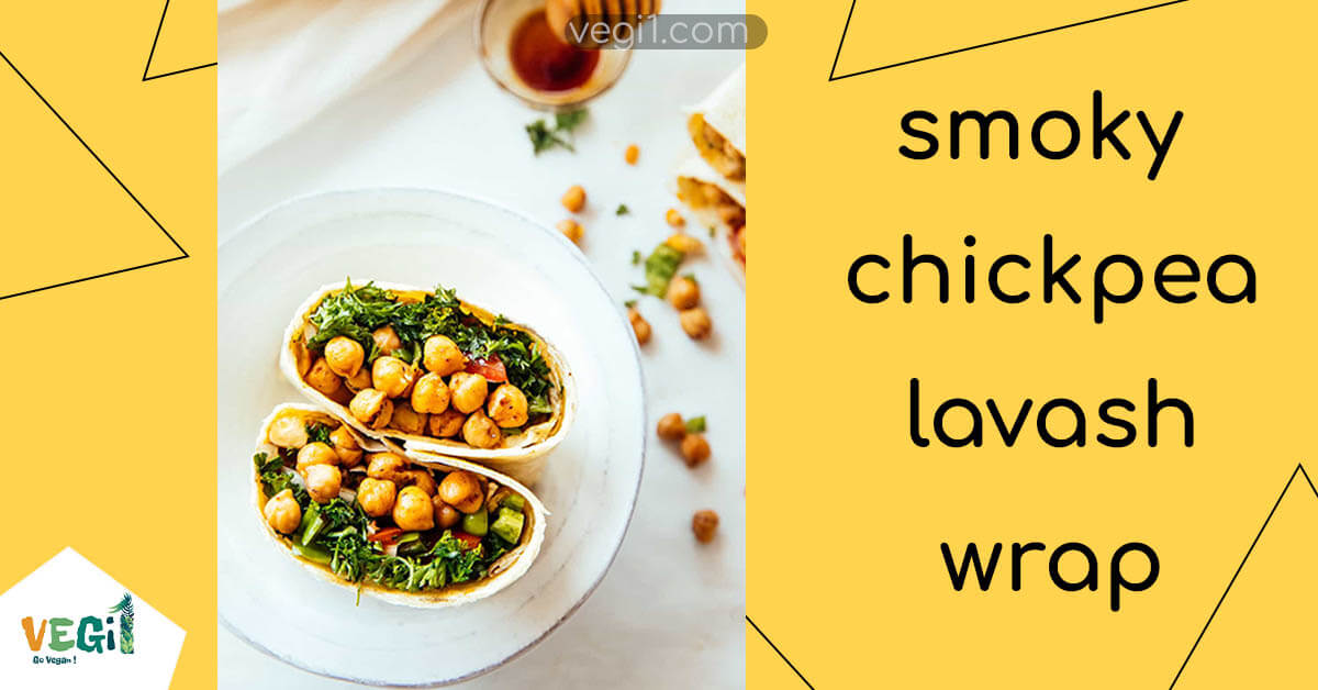 Smoky chickpea lavash wrap with hummus and veggies on a plate