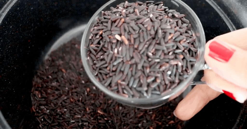 Try this vegan black rice pilaf recipe with carrots for a healthy and delicious meal packed with nutrients and flavor.