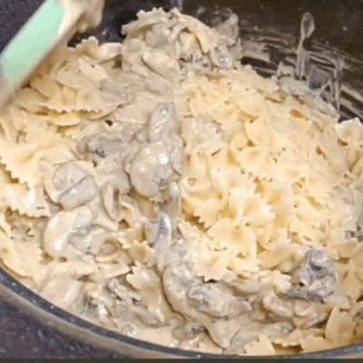 Indulge in the ultimate comfort food with our Creamy Vegan Mushroom and Vegetable Alfredo Pasta. This easy recipe combines the richness of cheese powder and flour with a burst of flavors from herbs and veggies. 