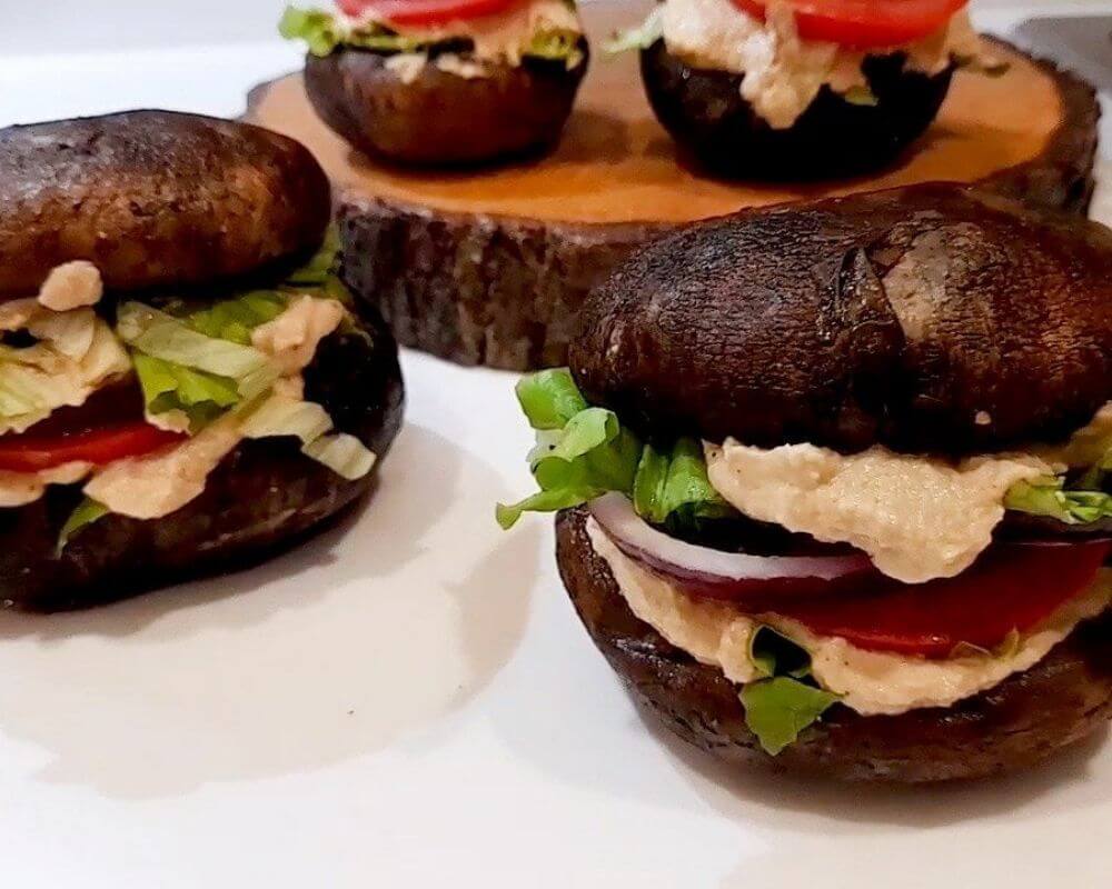 Savor the goodness of a Raw Vegan Cheeseburger - a guilt-free delight packed with mushrooms and vegan cheese, promoting weight loss and enhanced nutrition!